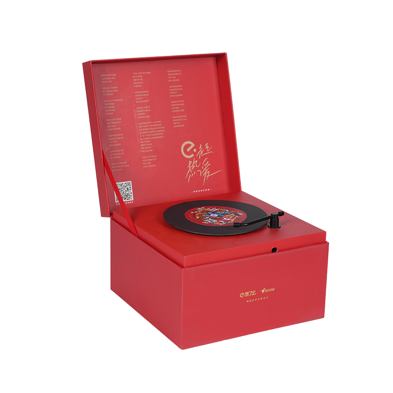 Жесткая вращающаяся музыкальная шкатулка в форме книги в праздничном стиле.